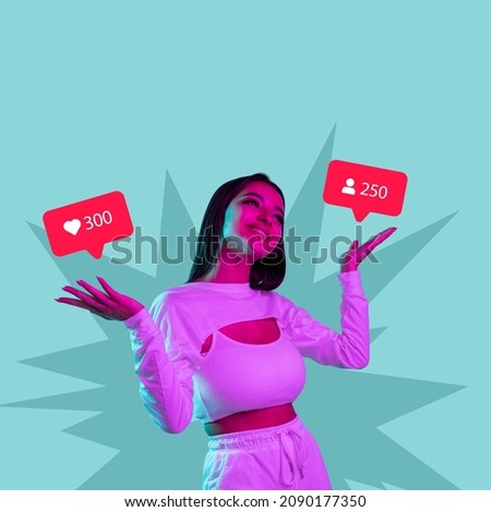 Creative design of young beautiful smiing girl having many social media popularity isolated over blue background. Concept of social media, influence, popularity, modern lifestyle and ad