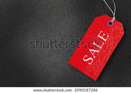 Black Friday Sale or Discount banner. A tag over black background.