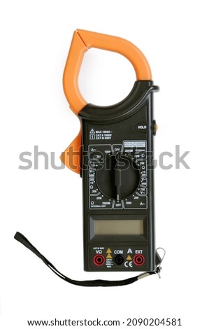 Current clamp, multimeter isolated on white background