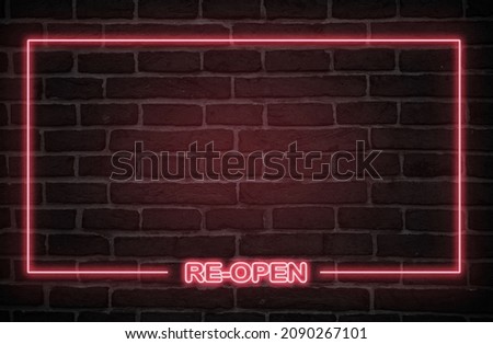 Red neon sign on a wall