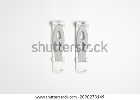 Plastic hangers for shoes isolated on white background.High resolution photo.Top view. Mock-up.
