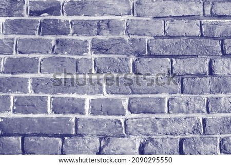brick wall Background, old  brick wall texture. toning Very Peri, color 2022            
