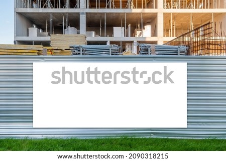 Advertising banner mock-up on a fence of the construction site