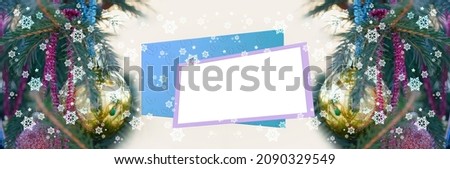 A widescreen Christmas unfocused background with an empty text frame and decorated fir branches. Artistic design, banner