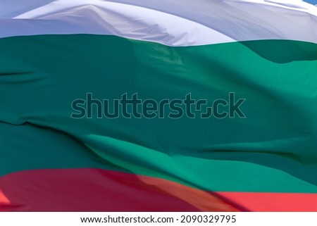 Part of Bulgarian national flag waving, close-up. Republic of Bulgaria, BG