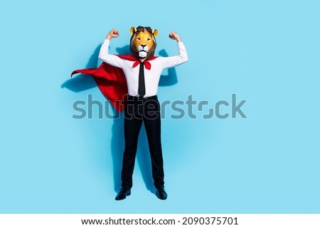 Full length photo of weird crazy guy in lion mask show muscular strong body ready save animal world isolated over blue color background