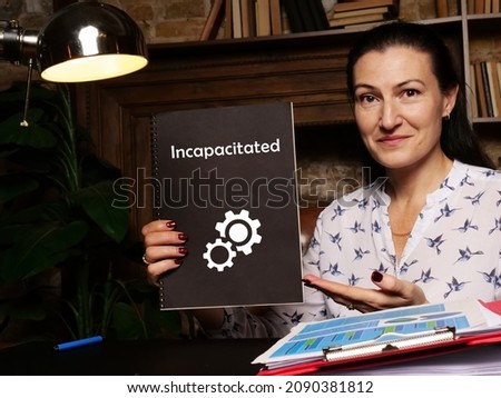 Financial concept meaning Incapacitated with sign on blank card in hand.
