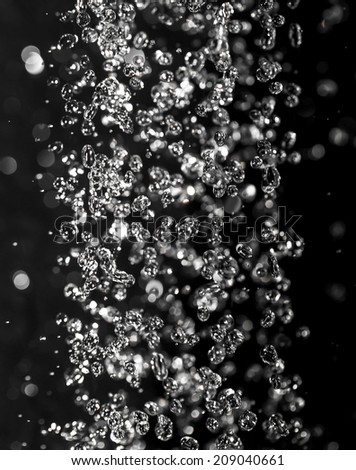 drops of water on black background