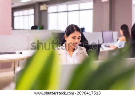 Casual asian woman working in the office,Young beautiful women at workplace
