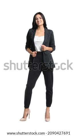 Full length portrait of beautiful woman in formal suit on white background. Business attire Royalty-Free Stock Photo #2090427691