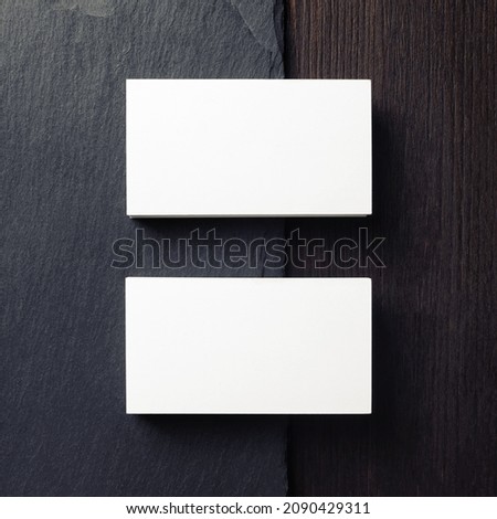 Photo of two blank business cards. Branding ID template. Top view. Flat lay.