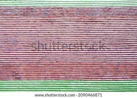 Roof tile texture in seamless patterns for brown green background