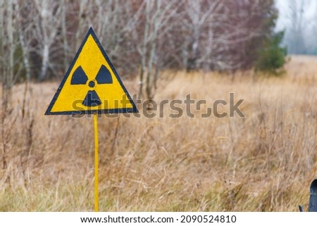 Radiation warning sign in Chernobyl Exclusion Zone in Ukraine