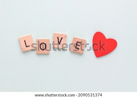 Wooden blocks in a pastel board with the text end heart.