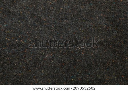 High Resolution black fabric close up with colourful dots