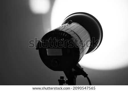illuminator for a photo studio head with a pot on a white background