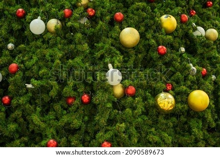Green Chirstmas tree with ball and light use for background,wallpaper,banner,poster concept.,Happy new year, To Celebrate Chirstmas.