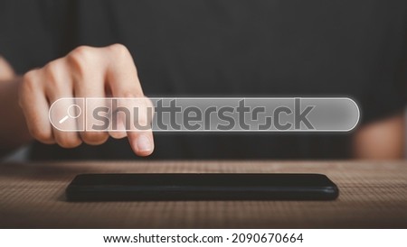 Searching for information, Search engine technology in web browsers, using search engines to find information in the Internet, SEO concept. Businessman's hand touch smartphone.