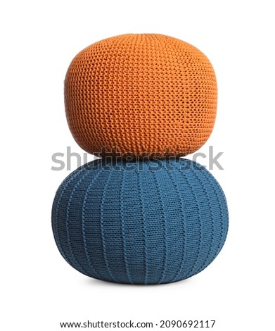 Different stylish poufs on white background. Home design