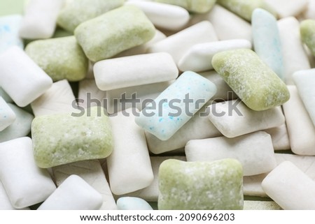 Different chewing gums as background