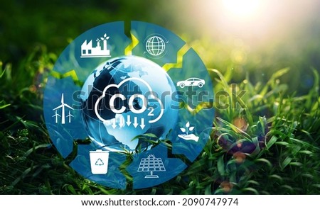Reduce CO2 emission. Sustainable development concept. Renewable energy-based green businesses can limit climate change and global warming.  Royalty-Free Stock Photo #2090747974
