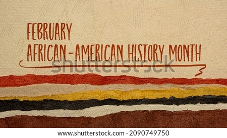 February -  African American History Month, handwriting against abstract paper landscape in earth tones, annual observance originating in the United States, Black  History Month Royalty-Free Stock Photo #2090749750