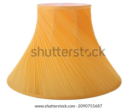 classic cut corner deluxe bell shaped  yellow tapered lampshade on a white background isolated close up shot 