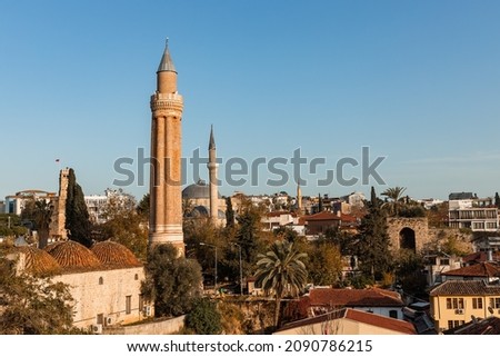 Yivliminare Mosque (Yivliminare Cami), Ulu Mosque in Antalya, historical mosque built by the Anatolian Seljuk Sultan Alaaddin Keykubad, The fluted minaret. Royalty-Free Stock Photo #2090786215