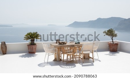 Summer terrace with stylish trendy outdoor furniture at a luxurious travel destination. Royalty-Free Stock Photo #2090788063