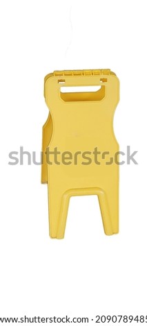 Yellow wet floor sign on white background.