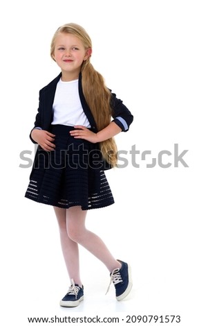 Lovely little girl in school uniform