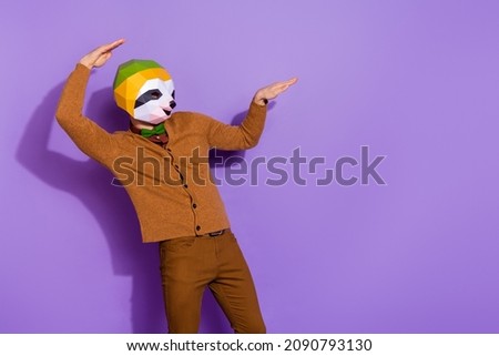 Photo of young guy dance unusual outfit clubber look empty space isolated over violet color background