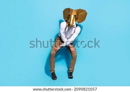 Full body photo of young man clubber dance performance authentic outfit isolated over blue color background