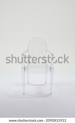 transparent plastic chair on white background