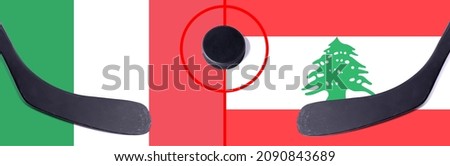 Top view hockey puck with Italy vs. Lebanon command with the sticks on the flag. Concept hockey competitions