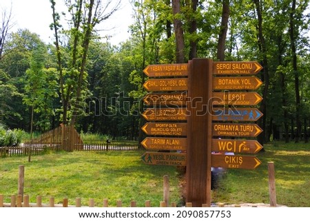 Guiding signs made of wood in Izmit Ormanya Gezi Park. selective focus