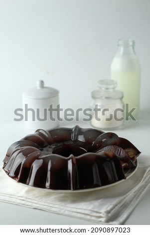 Chocolate pudding served on a plate, tastes sweet and delicious,shinny and blurry texture,selective focus,noise Royalty-Free Stock Photo #2090897023