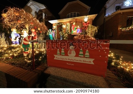 Holiday lights and decorations adorn a home in the Dyker Heights section of Brooklyn in New York City on Tuesday, December 14, 2021. (Gordon Donovan)
