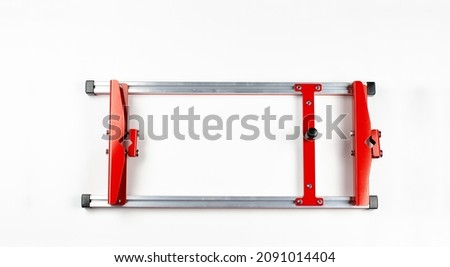 Sawmill for chainsaw. Chainsaw mobile sawmill. Chainsaw attachment. On white background