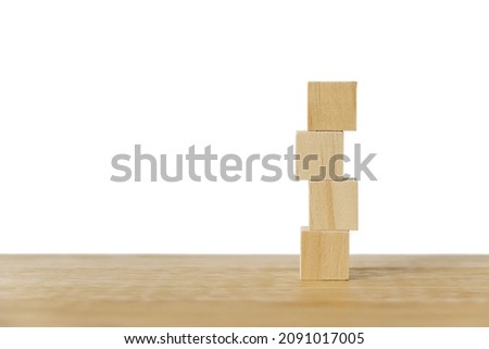 stack of blank wooden cubes on wood table with clipping path for infographic icon, input wording and  create icon symbol to success, business growth teamwork or leadership concept
