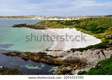 Landscape view of Beautiful island white sand beach and turquoise water.