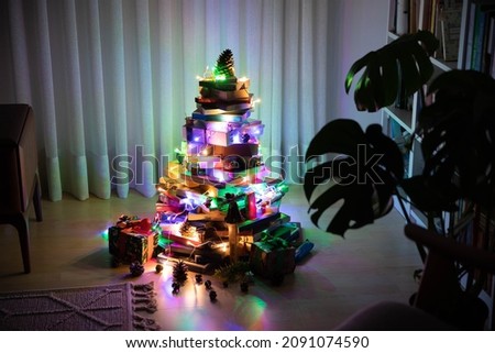 Book christmas tree, Christmas tree idea from decorative book at home. and lights