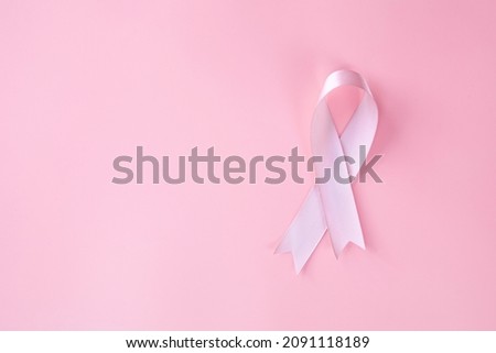 Pink ribbon breast cancer awareness, Health medical concept, pink background pink background copy space