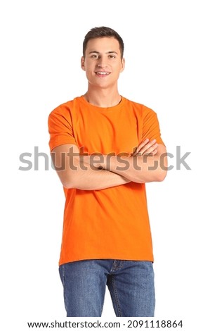 Handsome man in orange t-shirt on white background