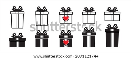 Gift box vector icon set. Valentine gift boxes in different size from short to high shape. Present box tied with bow tie ribbon and decorated with heart. Vector stock for sign and illustration.