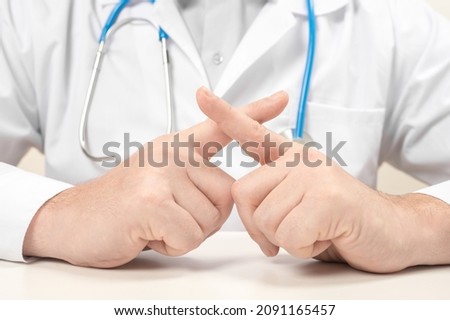 prohibition on medical indications. Doctor make cross stop sign, prohibit or forbid. Medicine and health care concept. Doctor forbids smoking, fatty foods, drinking alcohol, unhealthy lifestyle Royalty-Free Stock Photo #2091165457