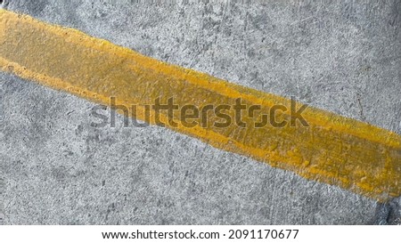 The asphalt parking path which have white line and yellow cross line because Some one change the rule off way.background
