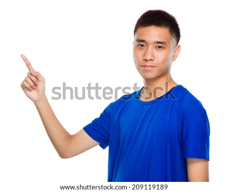 Asian young man with finger point out