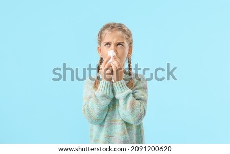 Little allergic girl on color background