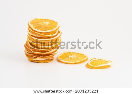 dried slice of orange, dry orange, white background, fruit, dry fruit, slice orange Royalty-Free Stock Photo #2091233221